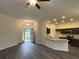 Inviting living space featuring modern kitchen, stylish flooring, and ample natural light at 12864 Sw 40 Ter, Ocala, FL 34473