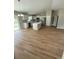 Bright open-concept kitchen with stainless steel appliances and a large island at 13714 Sw 114Th Pl, Dunnellon, FL 34432