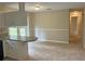 Open dining area featuring a breakfast bar and seamless transition to outdoor space at 1400 Ne 54Th St, Ocala, FL 34479