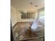 Bedroom featuring natural light from windows and wood-look floors at 2323 Sw 3Rd St, Ocala, FL 34471