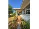 Covered front porch with brick accents, offering a cozy outdoor space at 2323 Sw 3Rd St, Ocala, FL 34471