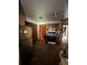 Outdated kitchen needing repair featuring old appliances and dark cabinetry at 2323 Sw 3Rd St, Ocala, FL 34471