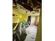 Damaged living room with yellow walls, showing the need for extensive repairs at 2323 Sw 3Rd St, Ocala, FL 34471