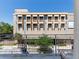 A private balcony with a view of the street and nearby building on a bright day at 302 Se Broadway St # 330, Ocala, FL 34471