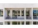 Close-up of private balconies with modern railings, offering a glimpse of the beautiful neighborhood at 302 Se Broadway St # 330, Ocala, FL 34471