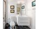 This bright bathroom features a floating vanity, stylish accents, and a modern toilet and fixtures at 302 Se Broadway St # 330, Ocala, FL 34471
