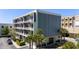 Modern four-story building featuring private balconies and ample parking, perfect for downtown living at 302 Se Broadway St # 330, Ocala, FL 34471