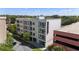 Four-story building with balconies situated downtown, offering convenient access to city amenities at 302 Se Broadway St # 330, Ocala, FL 34471
