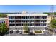 Well-lit four-story building featuring private balconies and ample parking for convenient city living at 302 Se Broadway St # 330, Ocala, FL 34471