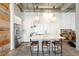 Modern kitchen featuring white cabinetry, stainless steel appliances, and island seating at 302 Se Broadway St # 330, Ocala, FL 34471