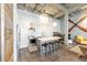 Open kitchen featuring stainless steel appliances, white cabinets, and island seating at 302 Se Broadway St # 330, Ocala, FL 34471