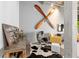 Stylish living area featuring an aviation theme with decorative propeller and modern furniture at 302 Se Broadway St # 330, Ocala, FL 34471