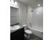 Well-lit bathroom with a granite vanity, and a shower-tub combination at 3474 Sw 155Th Pl, Ocala, FL 34473