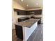 Kitchen with granite countertops, stainless steel appliances, and ample cabinet space at 3474 Sw 155Th Pl, Ocala, FL 34473