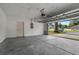 Spacious garage with an automatic door and interior access to the house at 4246 Ne 32Nd Cir, Ocala, FL 34479