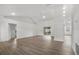 Spacious living room with hardwood floors and abundant natural light at 4246 Ne 32Nd Cir, Ocala, FL 34479