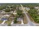 Birds-eye view showcases this home's setting among tree-lined streets in a tranquil neighborhood at 44 Pecan Run Dr, Ocala, FL 34472