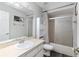 Bathroom with shower-tub combo, single sink vanity, and neutral color palette at 44 Pecan Run Dr, Ocala, FL 34472