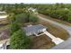 Lovely single-Gathering home boasting a gray roof, well-kept lawn, and convenient driveway access at 44 Pecan Run Dr, Ocala, FL 34472