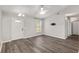 Bright living room featuring hard wood floors and natural light at 44 Pecan Run Dr, Ocala, FL 34472