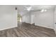 Bright and open living room featuring new floors at 44 Pecan Run Dr, Ocala, FL 34472