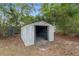 The backyard features a storage shed and is great for storing tools, equipment, or outdoor furniture at 44 Pecan Run Dr, Ocala, FL 34472