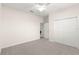 Neutral bedroom features a ceiling fan and closet, perfect for relaxation at 4780 Sw 103Rd Street Rd, Ocala, FL 34476