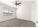 Bedroom featuring a window letting in natural light and neutral carpet at 4780 Sw 103Rd Street Rd, Ocala, FL 34476