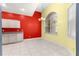 Bright dining area features tile floors, chandelier, and a large window letting in lots of natural light at 4780 Sw 103Rd Street Rd, Ocala, FL 34476