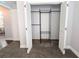 Open closet with bi-fold doors and wire shelving at 4785 Ne 28Th Ter, Ocala, FL 34479