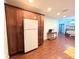 Kitchen features dark wood cabinets and modern stainless steel appliances at 4785 Ne 28Th Ter, Ocala, FL 34479