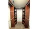 A Walk-in Closet with built-in shelving and ample storage space at 4785 Ne 28Th Ter, Ocala, FL 34479