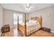 Bedroom with natural light and hardwood flooring at 5026 Sw 128Th St, Ocala, FL 34473