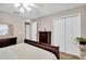 Bright bedroom with wood floors and a closet, providing storage solutions at 5026 Sw 128Th St, Ocala, FL 34473