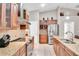 Well-equipped kitchen featuring stainless steel appliances, granite countertops, and tile backsplash at 5026 Sw 128Th St, Ocala, FL 34473