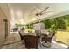 Covered patio with ceiling fan, seating, outdoor kitchen and view of shed at 5026 Sw 128Th St, Ocala, FL 34473