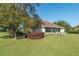 Lovely backyard with mature trees providing shade and privacy at 5363 Nw 153Rd Ct, Morriston, FL 32668