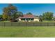 The home features a large, fenced-in backyard offering space for outdoor activities at 5363 Nw 153Rd Ct, Morriston, FL 32668