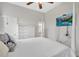 Bedroom showcasing a TV, closet and easy access to the bathroom at 5363 Nw 153Rd Ct, Morriston, FL 32668