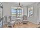 Cozy kitchen nook with paisley chairs and natural light at 5363 Nw 153Rd Ct, Morriston, FL 32668