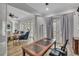 Chic office space with seamless access to the living room and outdoor patio at 5363 Nw 153Rd Ct, Morriston, FL 32668