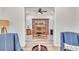 Elegant office space with a large desk, built-in bookcase, and hardwood floors at 5363 Nw 153Rd Ct, Morriston, FL 32668
