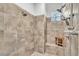 The large, tiled shower has dual shower heads, and a built in bench at 5363 Nw 153Rd Ct, Morriston, FL 32668