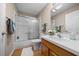 Bathroom featuring a shower-tub combo, white cabinets and white countertop at 710 Antonia Ln, The Villages, FL 32159