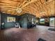Unique flex space with wood vaulted ceilings, brick floors and eclectic decor at 7161 Ne 22Nd Court Rd, Ocala, FL 34479