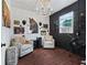 A unique flex space with seating area and custom art work at 7161 Ne 22Nd Court Rd, Ocala, FL 34479