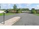 View of the front gate entrance with security system and gate with horse logo at 7161 Ne 22Nd Court Rd, Ocala, FL 34479