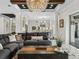 Living room flows into kitchen with a view of kitchen island at 7161 Ne 22Nd Court Rd, Ocala, FL 34479