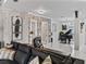 Open-concept living space boasts a piano, modern art, and stylish decor throughout the room at 7161 Ne 22Nd Court Rd, Ocala, FL 34479