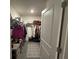 Spacious walk-in closet with shelving and rods for ample storage and organization at 7198 Sw 136Th Street Rd, Ocala, FL 34473